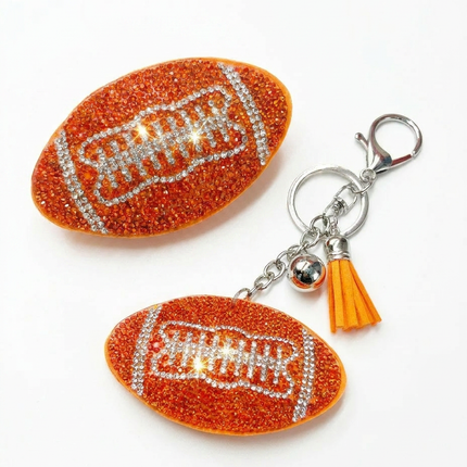 SUPERVALUECHOICE HCSESA00094 Shiny blue football-shaped brooch and keychain