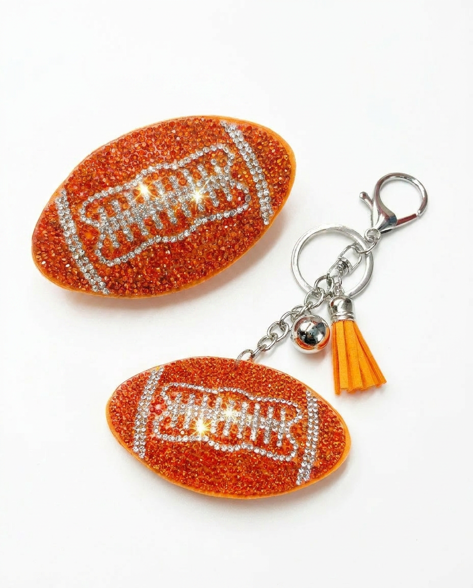 SUPERVALUECHOICE HCSESA00094 Shiny blue football-shaped brooch and keychain