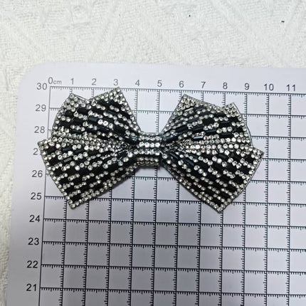 SUPERVALUECHOICE CHRISTMAS HCSEYD00048  Sparkly Crystal Bow Patch