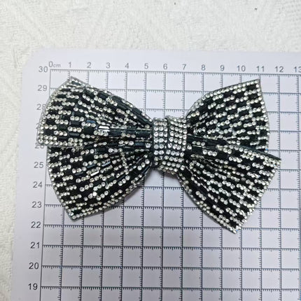 SUPERVALUECHOICE CHRISTMAS HCSEYD00048  Sparkly Crystal Bow Patch