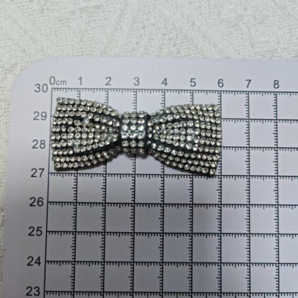 SUPERVALUECHOICE CHRISTMAS HCSEYD00048  Sparkly Crystal Bow Patch